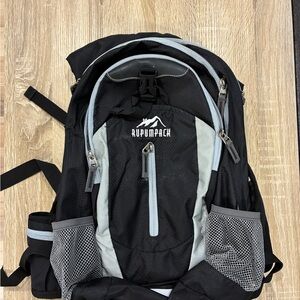 Black and Gray Backpack with hydration pouch